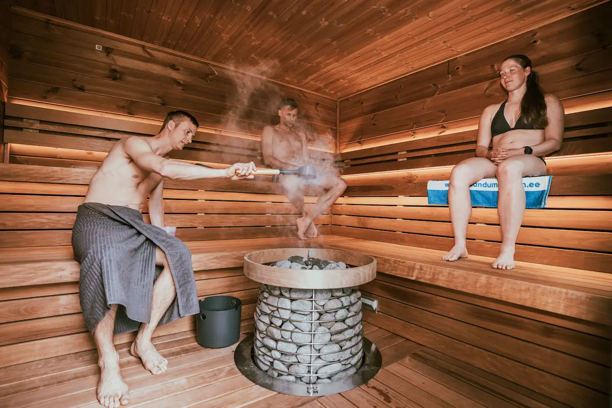 Two men enjoying the sauna together at Sauna Club Co Wheat Ridge